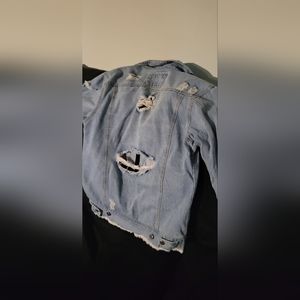 Distressed jean jacket